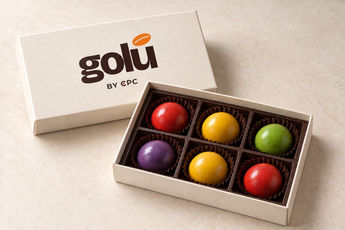Open Golú box with six colorful bonbons